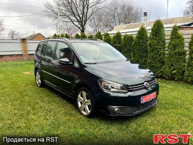 Зеленый Фольксваген Туран, объемом двигателя 2 л и пробегом 282 тыс. км за 10700 $, фото 1 на Automoto.ua