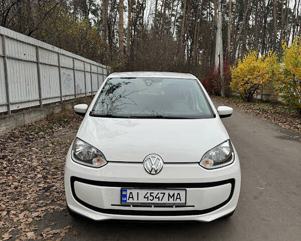 Белый Фольксваген Ап, объемом двигателя 1 л и пробегом 166 тыс. км за 6499 $, фото 1 на Automoto.ua