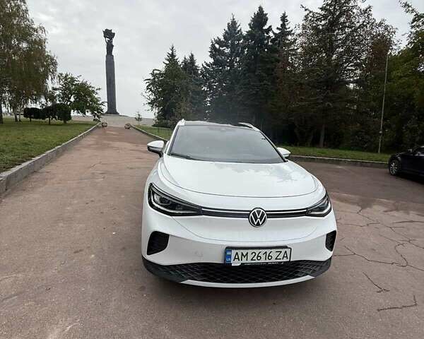 Белый Фольксваген ID.4, объемом двигателя 0 л и пробегом 95 тыс. км за 22999 $, фото 1 на Automoto.ua