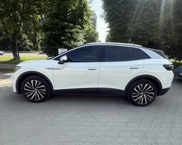 Белый Фольксваген ID.4, объемом двигателя 0 л и пробегом 55 тыс. км за 24300 $, фото 1 на Automoto.ua