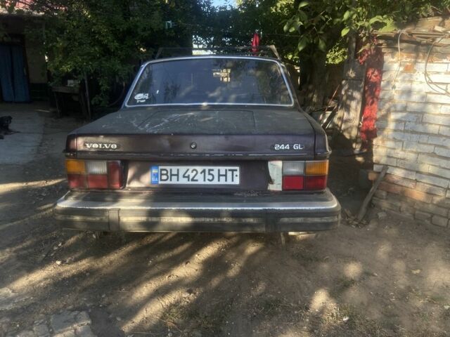 Коричневый Вольво 244, объемом двигателя 2 л и пробегом 219 тыс. км за 480 $, фото 1 на Automoto.ua