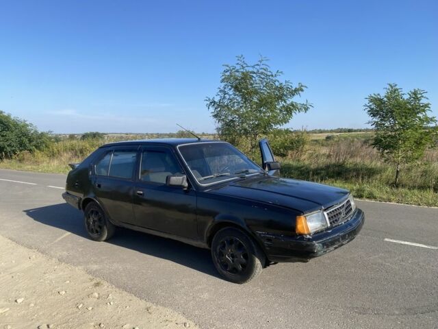 Черный Вольво 340, объемом двигателя 2 л и пробегом 180 тыс. км за 403 $, фото 1 на Automoto.ua