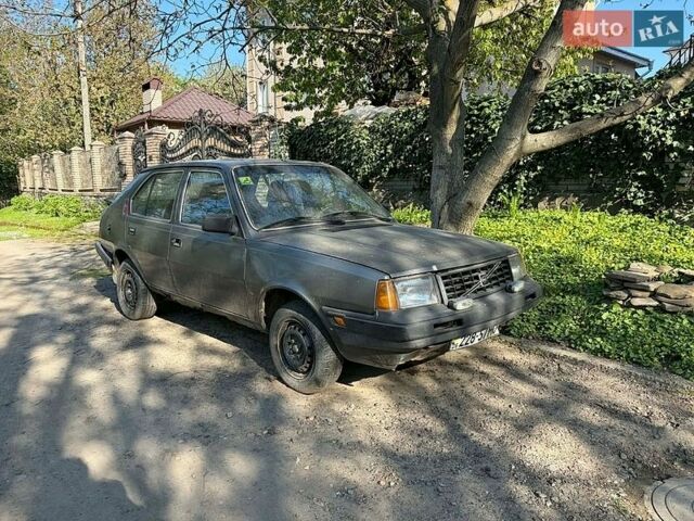 Серый Вольво 340, объемом двигателя 1.4 л и пробегом 200 тыс. км за 400 $, фото 1 на Automoto.ua