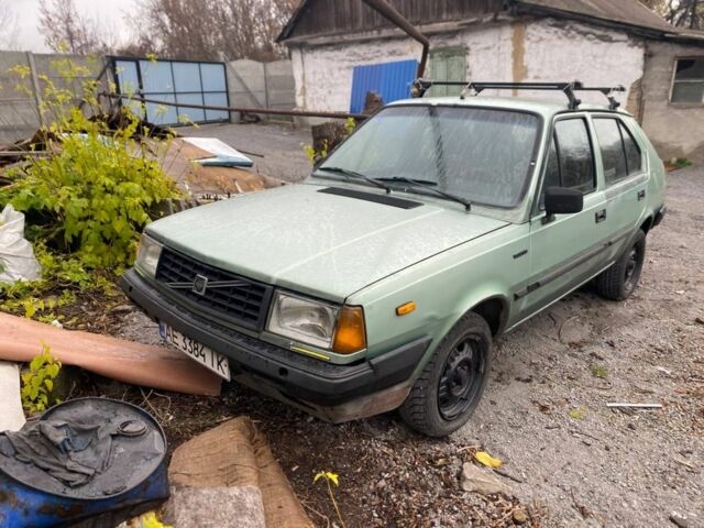 Зеленый Вольво 340, объемом двигателя 2 л и пробегом 300 тыс. км за 2000 $, фото 1 на Automoto.ua