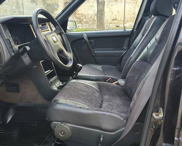 Чорний Вольво 440, об'ємом двигуна 2 л та пробігом 340 тис. км за 2000 $, фото 1 на Automoto.ua