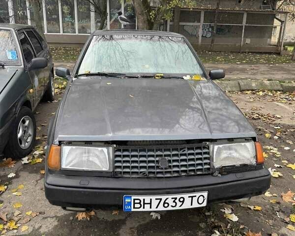 Серый Вольво 440, объемом двигателя 1.7 л и пробегом 280 тыс. км за 1100 $, фото 1 на Automoto.ua