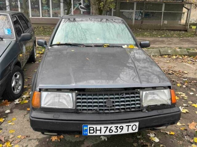 Серый Вольво 440, объемом двигателя 1.7 л и пробегом 280 тыс. км за 1100 $, фото 1 на Automoto.ua