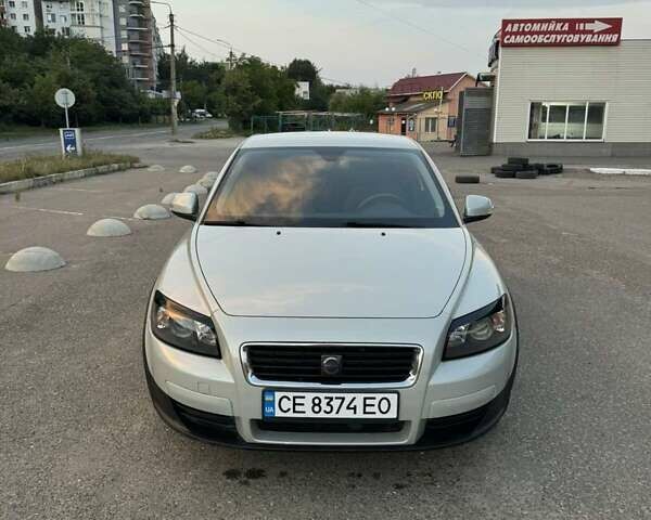Серый Вольво Ц30, объемом двигателя 1.6 л и пробегом 235 тыс. км за 6450 $, фото 1 на Automoto.ua