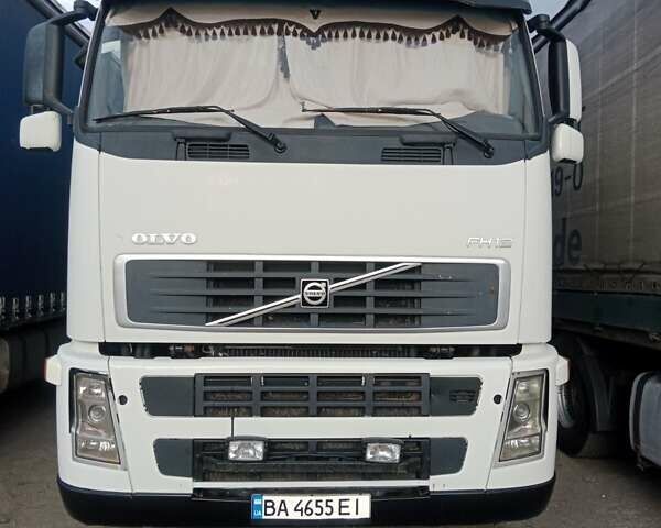Белый Вольво FH 12, объемом двигателя 12.1 л и пробегом 150 тыс. км за 18500 $, фото 1 на Automoto.ua