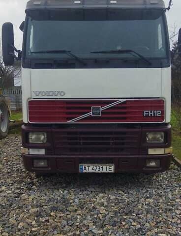 Белый Вольво FH 12, объемом двигателя 12.1 л и пробегом 450 тыс. км за 16700 $, фото 1 на Automoto.ua