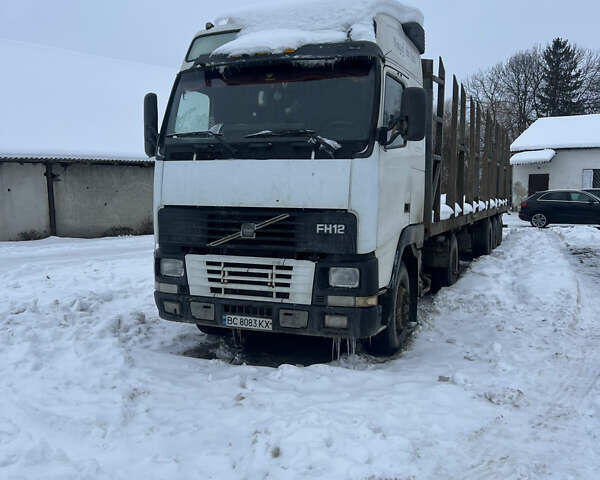 Белый Вольво FH 12, объемом двигателя 12.13 л и пробегом 999 тыс. км за 9300 $, фото 1 на Automoto.ua