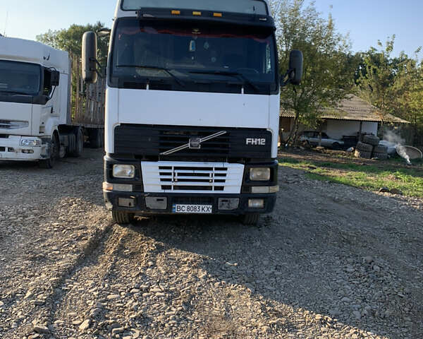 Белый Вольво FH 12, объемом двигателя 11 л и пробегом 900 тыс. км за 12000 $, фото 1 на Automoto.ua