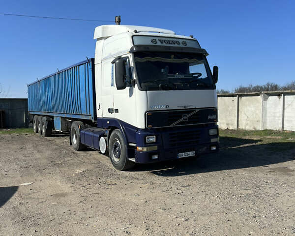 Белый Вольво FH 12, объемом двигателя 12.13 л и пробегом 700 тыс. км за 9500 $, фото 1 на Automoto.ua
