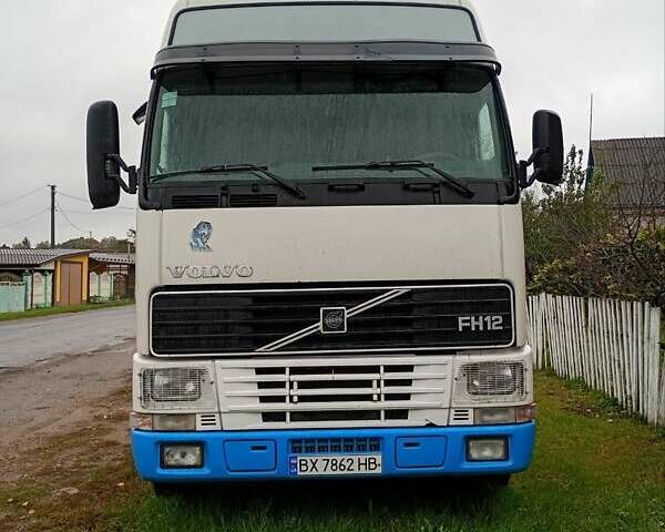 Белый Вольво FH 12, объемом двигателя 12.1 л и пробегом 1000 тыс. км за 8000 $, фото 1 на Automoto.ua