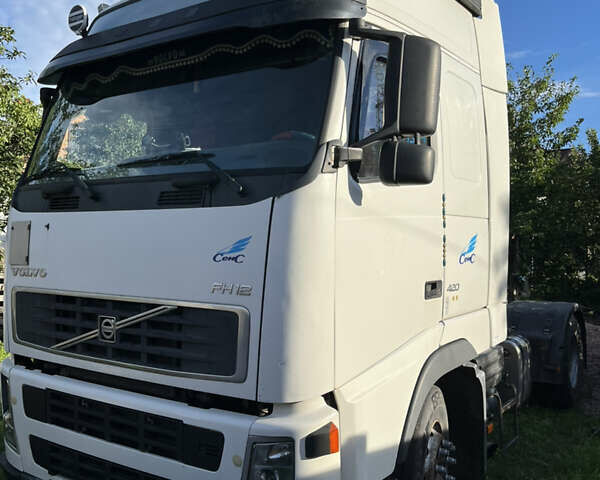 Белый Вольво FH 12, объемом двигателя 12.1 л и пробегом 2 тыс. км за 8500 $, фото 1 на Automoto.ua