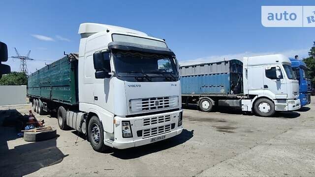 Белый Вольво FH 12, объемом двигателя 12.1 л и пробегом 768 тыс. км за 8000 $, фото 1 на Automoto.ua