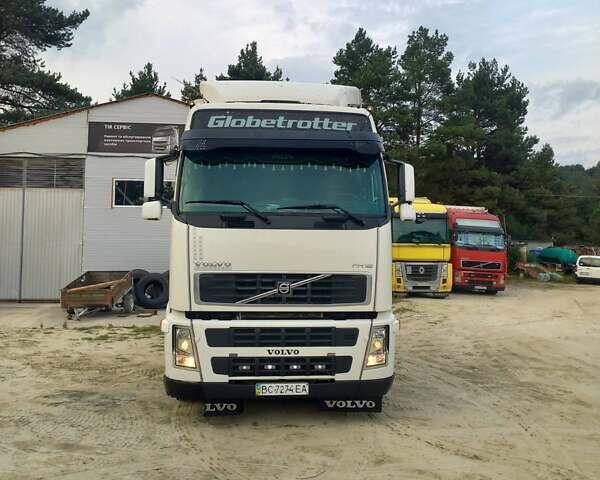 Белый Вольво FH 12, объемом двигателя 12.13 л и пробегом 830 тыс. км за 10300 $, фото 1 на Automoto.ua