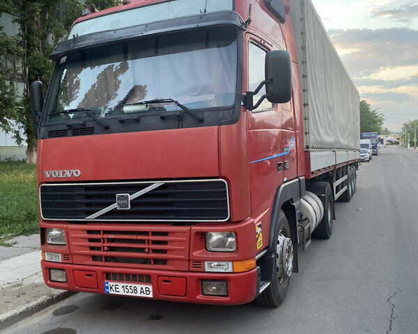 Красный Вольво FH 12, объемом двигателя 12 л и пробегом 650 тыс. км за 10500 $, фото 1 на Automoto.ua