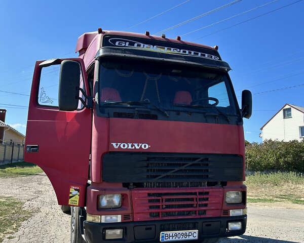 Красный Вольво FH 12, объемом двигателя 12.11 л и пробегом 1000 тыс. км за 6600 $, фото 1 на Automoto.ua