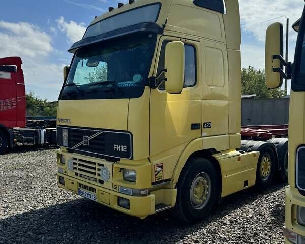 Желтый Вольво FH 12, объемом двигателя 0 л и пробегом 124 тыс. км за 9700 $, фото 1 на Automoto.ua