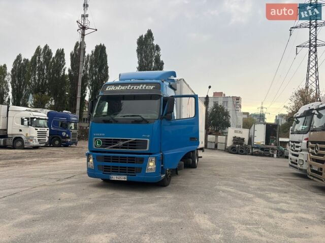 Синий Вольво FH 12, объемом двигателя 12.1 л и пробегом 1000 тыс. км за 22000 $, фото 1 на Automoto.ua