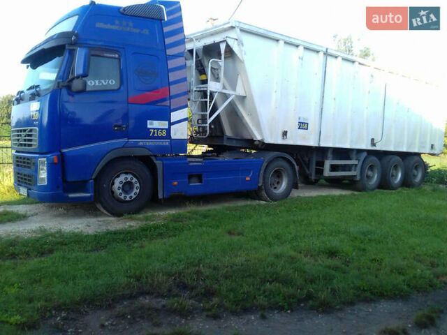 Синий Вольво FH 12, объемом двигателя 12.5 л и пробегом 500 тыс. км за 28000 $, фото 1 на Automoto.ua