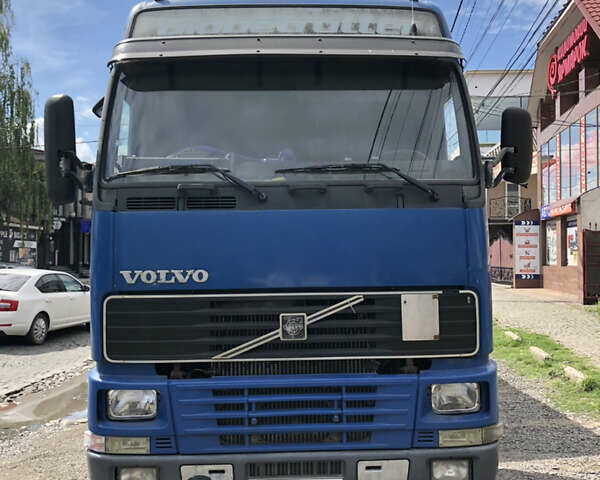 Синий Вольво FH 12, объемом двигателя 12.1 л и пробегом 500 тыс. км за 13500 $, фото 1 на Automoto.ua