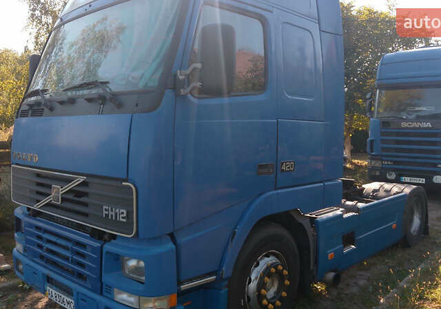 Синій Вольво FH 12, об'ємом двигуна 12.1 л та пробігом 111 тис. км за 6700 $, фото 1 на Automoto.ua