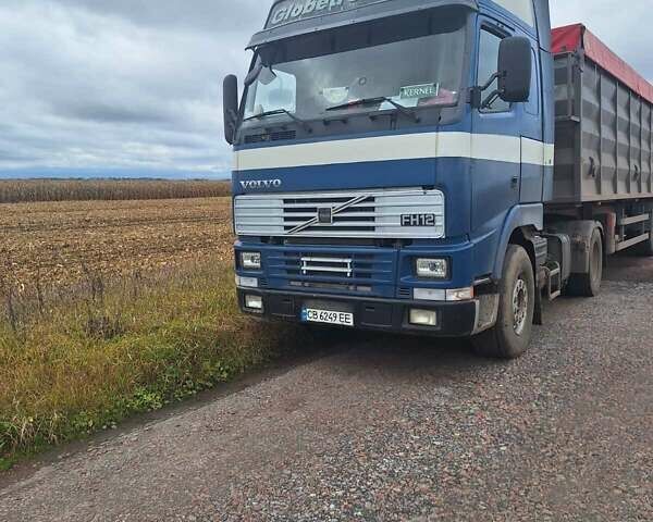 Синий Вольво FH 12, объемом двигателя 12.13 л и пробегом 700 тыс. км за 6400 $, фото 1 на Automoto.ua