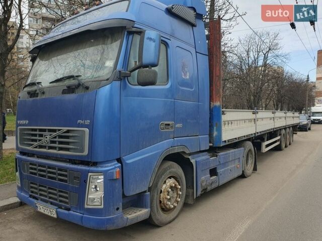 Синий Вольво FH 12, объемом двигателя 12 л и пробегом 999 тыс. км за 12000 $, фото 1 на Automoto.ua