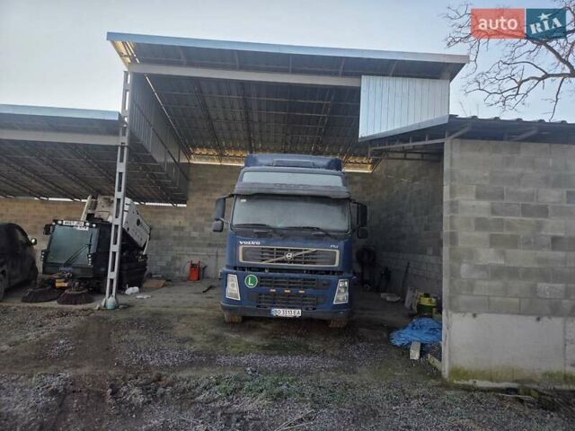 Синий Вольво FH 12, объемом двигателя 12.9 л и пробегом 1000 тыс. км за 35000 $, фото 1 на Automoto.ua