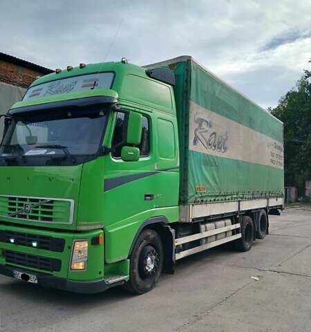 Зеленый Вольво FH 12, объемом двигателя 12.77 л и пробегом 120 тыс. км за 19000 $, фото 1 на Automoto.ua