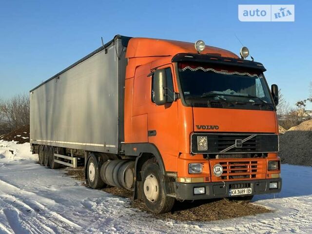 Оранжевый Вольво FH 12, объемом двигателя 12.1 л и пробегом 800 тыс. км за 20000 $, фото 1 на Automoto.ua