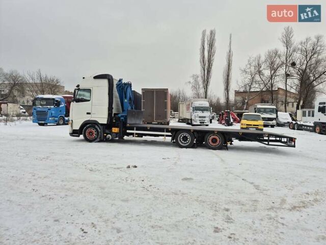 Белый Вольво FH 13, объемом двигателя 12.78 л и пробегом 428 тыс. км за 35500 $, фото 1 на Automoto.ua