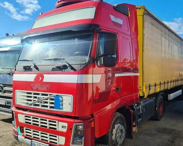 Красный Вольво FH 13, объемом двигателя 12.78 л и пробегом 450 тыс. км за 21000 $, фото 1 на Automoto.ua