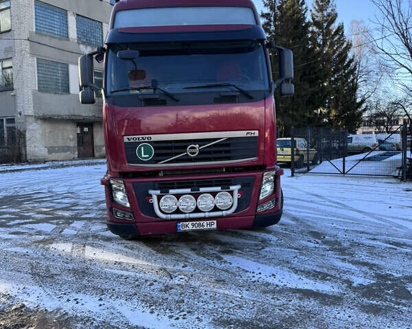 Червоний Вольво FH 13, об'ємом двигуна 12.78 л та пробігом 305 тис. км за 24000 $, фото 1 на Automoto.ua