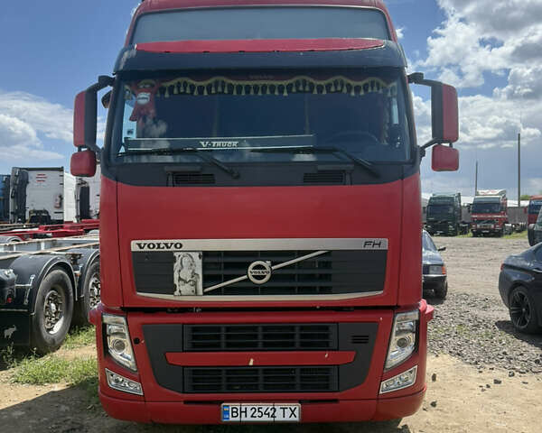 Червоний Вольво FH 13, об'ємом двигуна 12.78 л та пробігом 940 тис. км за 21000 $, фото 1 на Automoto.ua