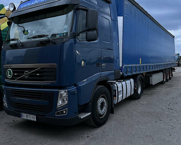 Синий Вольво FH 13, объемом двигателя 0 л и пробегом 870 тыс. км за 26000 $, фото 1 на Automoto.ua