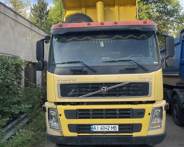Жовтий Вольво ФМ 12, об'ємом двигуна 12.1 л та пробігом 250 тис. км за 52000 $, фото 1 на Automoto.ua