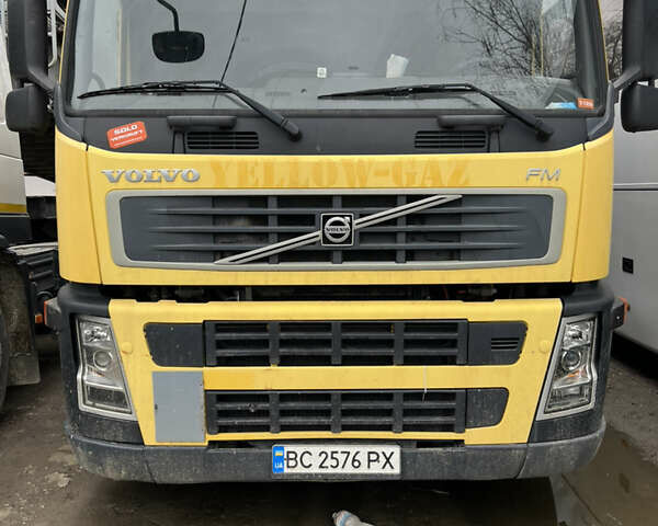 Желтый Вольво ФМ 12, объемом двигателя 9.37 л и пробегом 450 тыс. км за 35500 $, фото 1 на Automoto.ua
