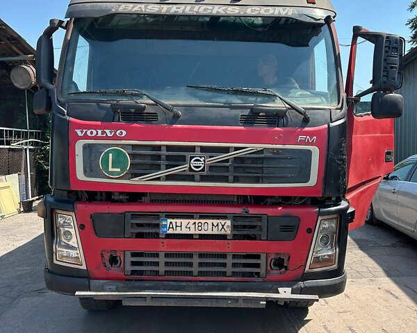 Красный Вольво FM 13, объемом двигателя 12.8 л и пробегом 380 тыс. км за 34000 $, фото 1 на Automoto.ua