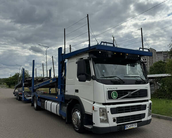 Белый Вольво FM 9, объемом двигателя 9.4 л и пробегом 106 тыс. км за 32000 $, фото 1 на Automoto.ua