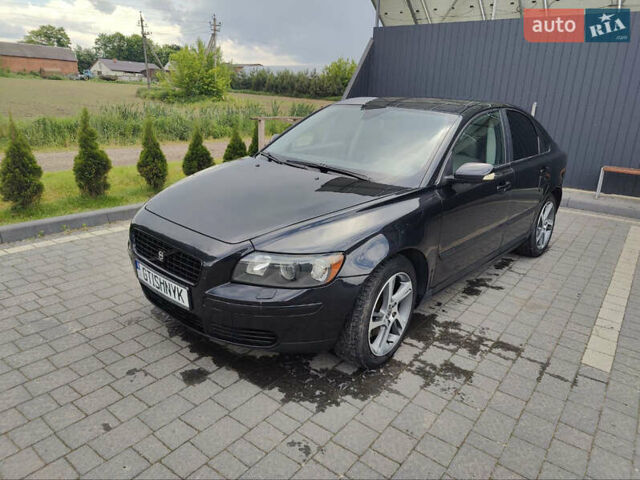 Черный Вольво С40, объемом двигателя 2 л и пробегом 328 тыс. км за 4400 $, фото 1 на Automoto.ua