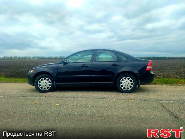 Черный Вольво С40, объемом двигателя 1.6 л и пробегом 260 тыс. км за 5500 $, фото 1 на Automoto.ua