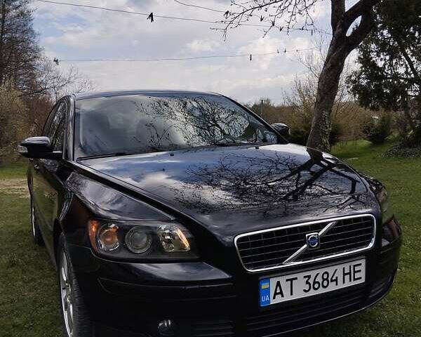Чорний Вольво S40, об'ємом двигуна 1.56 л та пробігом 298 тис. км за 5700 $, фото 1 на Automoto.ua