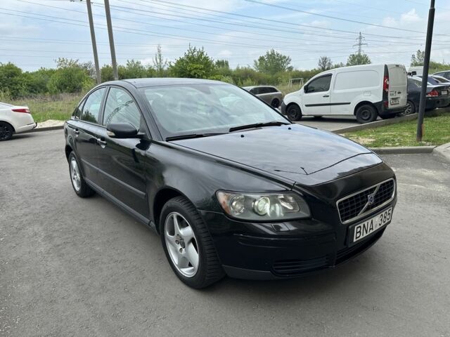 Черный Вольво С40, объемом двигателя 2.4 л и пробегом 300 тыс. км за 2650 $, фото 1 на Automoto.ua