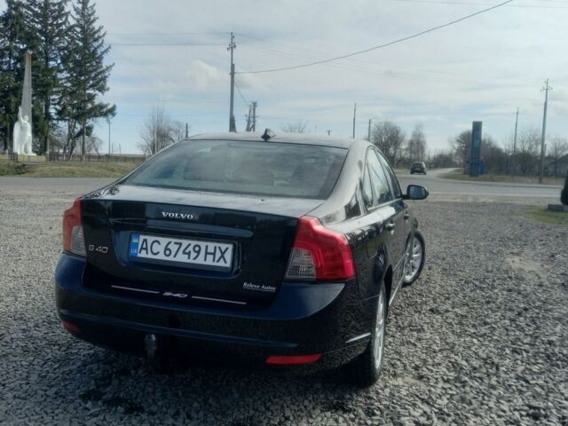 Чорний Вольво S40, об'ємом двигуна 1.56 л та пробігом 233 тис. км за 7000 $, фото 1 на Automoto.ua
