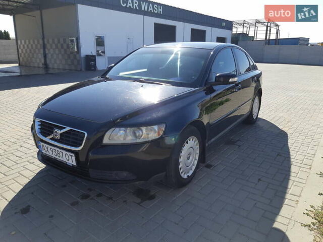 Чорний Вольво S40, об'ємом двигуна 1.6 л та пробігом 251 тис. км за 7000 $, фото 1 на Automoto.ua