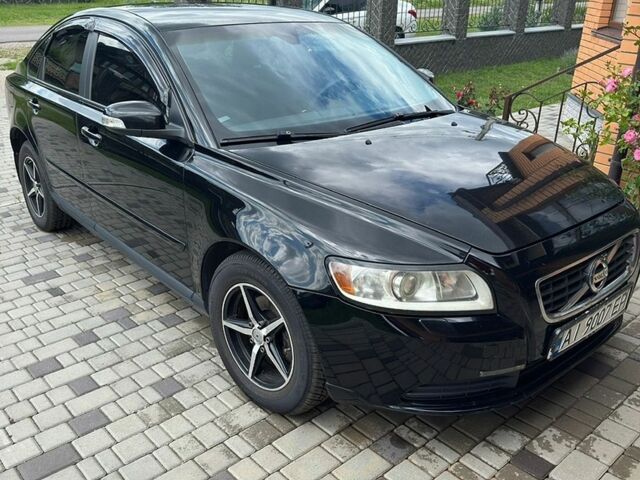 Черный Вольво С40, объемом двигателя 1.6 л и пробегом 215 тыс. км за 6400 $, фото 1 на Automoto.ua