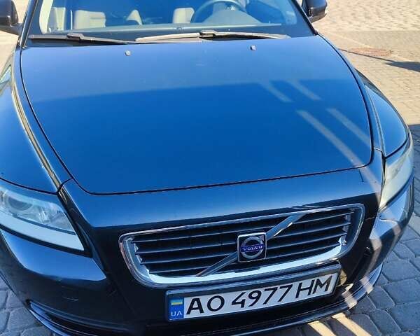 Черный Вольво С40, объемом двигателя 1.6 л и пробегом 241 тыс. км за 7700 $, фото 1 на Automoto.ua